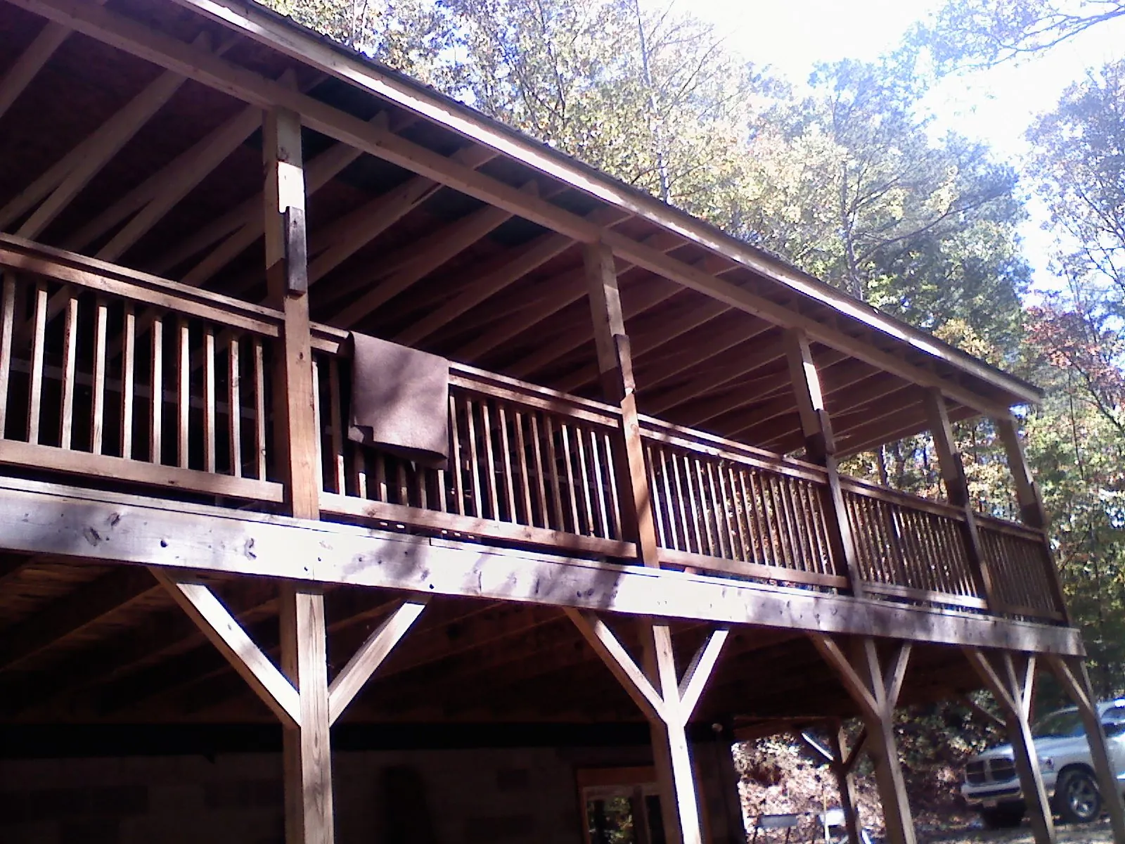 Timber framing under a new elevated porch and deck — Roof Leak Repair in Corryton by Roofing Brothers